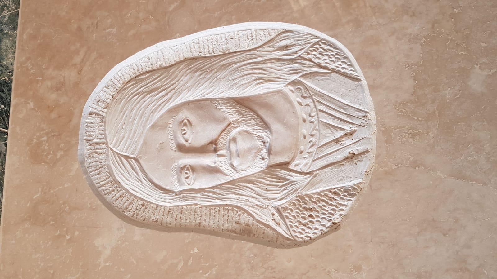 Volto di Cristo su travertino